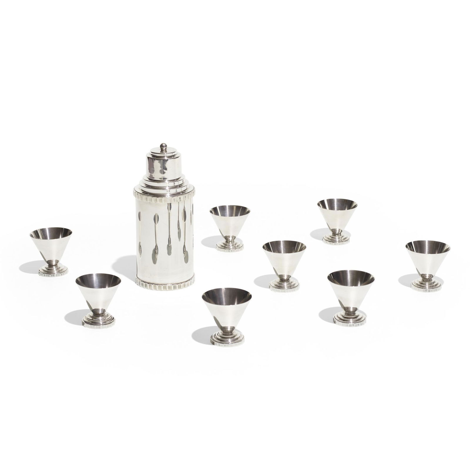 Danish, Art Deco cocktail shaker and eight cups: Danish Art Deco cocktail shaker and eight cups c. 1930silver-plated brass8.75 h × 3.75 dia in (22 × 10 cm) Signed and numbered to underside '11 Victoria P NS Import 2753'.