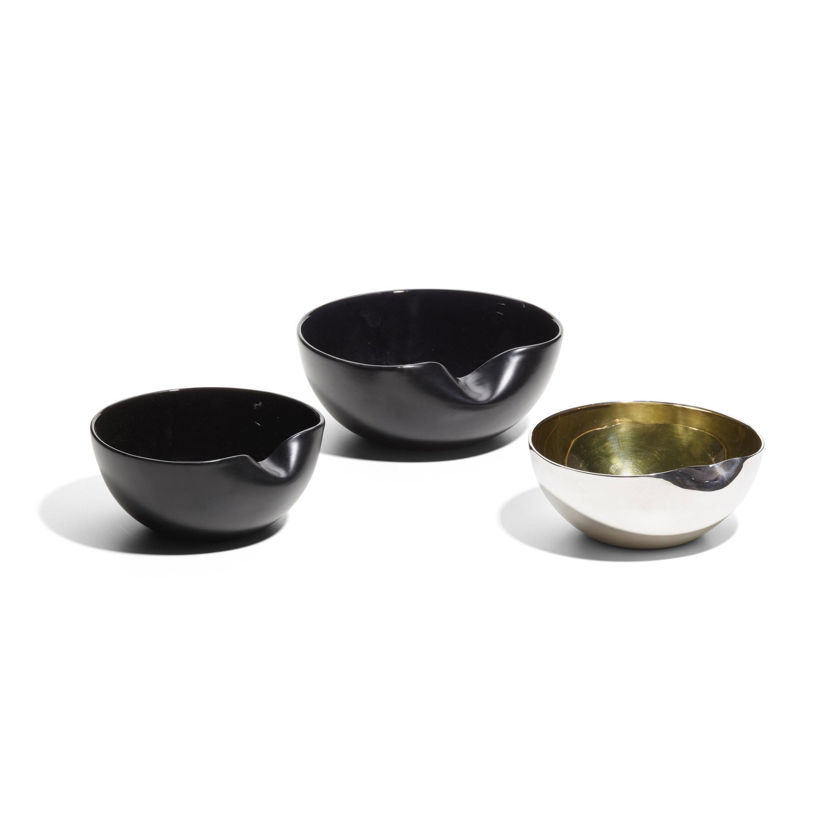Elsa Peretti for Tiffany & Co., Thumbprint bowls: Elsa Peretti for Tiffany & Co. Thumbprint bowls, collection of three USA, c. 1985 sterling silver, silver gilt, glazed porcelain 3.75 h × 9.25 w in (10 × 23 cm) Signed to underside of b