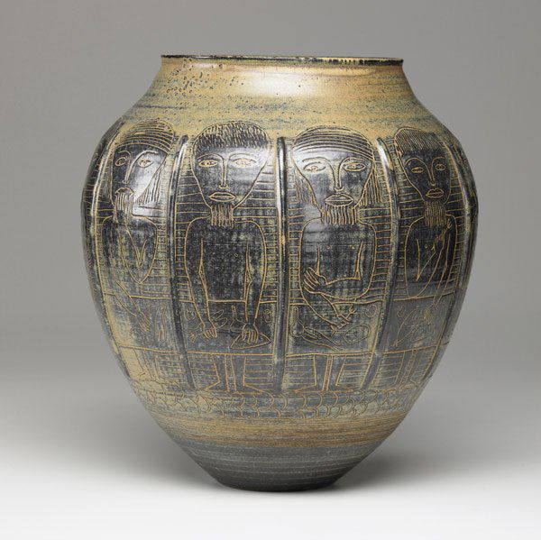 EDWIN AND MARY SCHEIER Early Large Ceramic Vase: EDWIN AND MARY SCHEIER Early, large ceramic vase covered in dark brown glaze with incised figural narrative design. Signed Scheier 49. 12'' x 12''