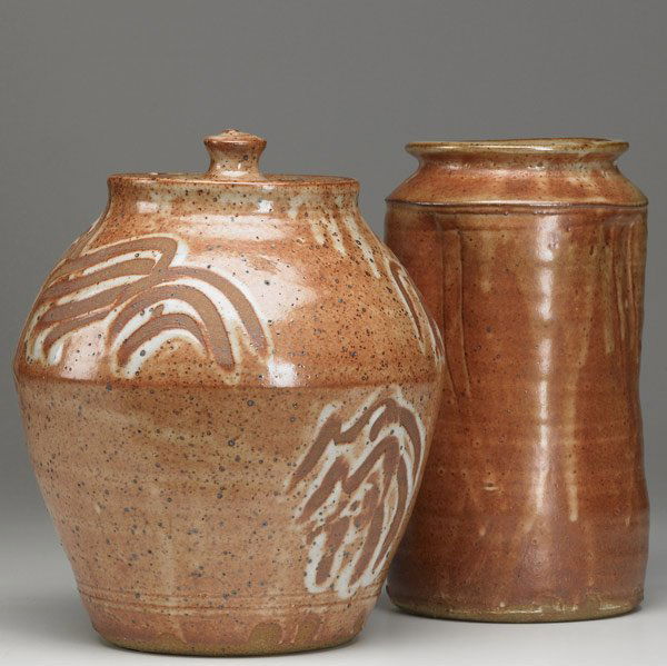 WARREN MacKENZIE Stoneware Jar: WARREN MacKENZIE Covered stoneware jar with glazed decoration and cylindrical vase covered in shino glaze. Each signed with artist cipher. 10 1/4'' x 10'' dia.; 10'' x 5 1/2'' dia.