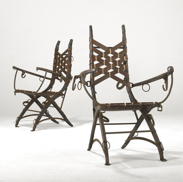 ALBERTO MARCONETTI Wood and iron armchairs: ALBERTO MARCONETTI Pair of wood and iron armchairs with woven leather seats and backs. 38 1/2'' x 27'' x 21''