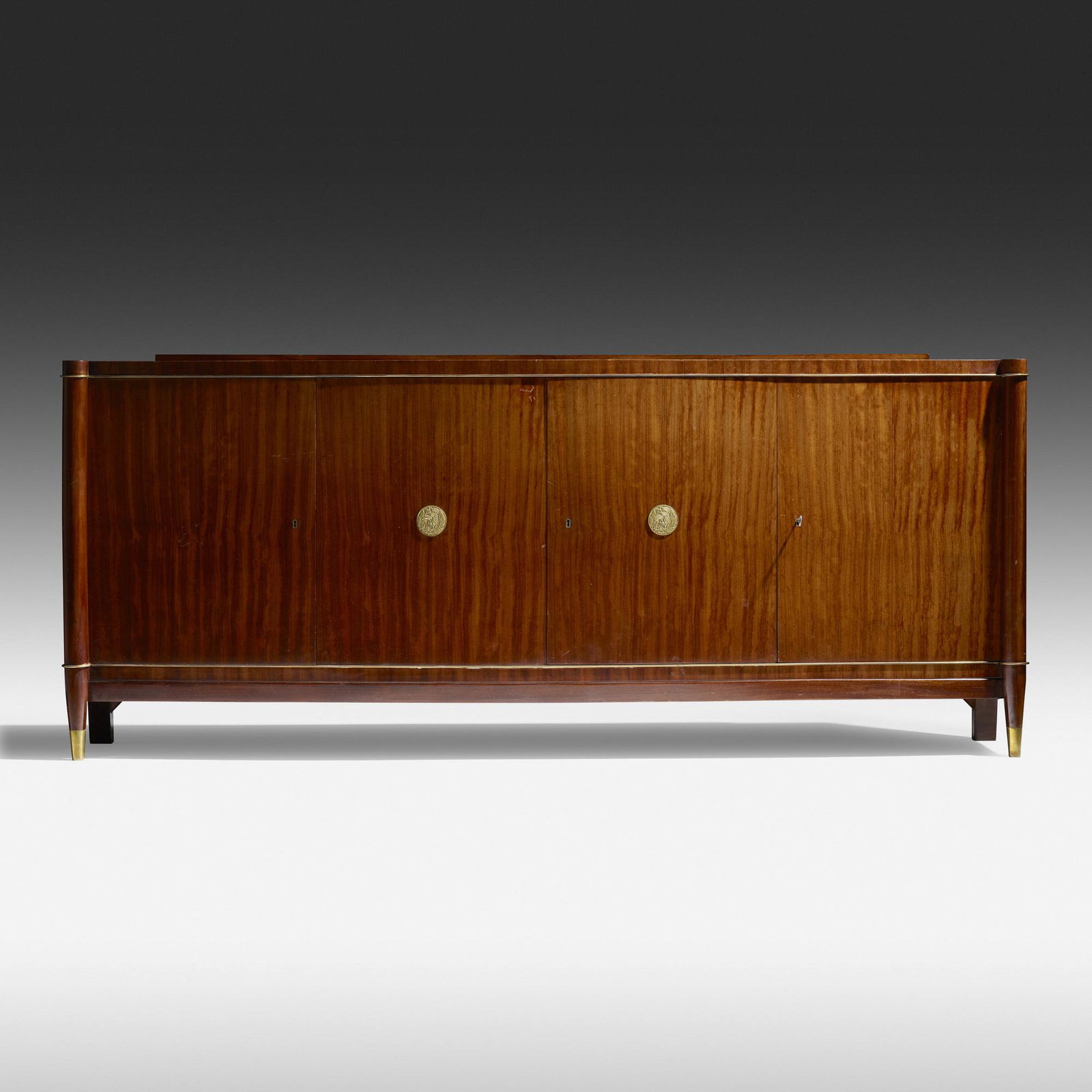 De Coene Frères, Cabinet: De Coene Frères Cabinet Belgium, c. 1945mahogany, brass39.25 h × 92.5 w × 19.5 d in (100 × 235 × 50 cm) Cabinet features four doors concealing three compartments, the cent