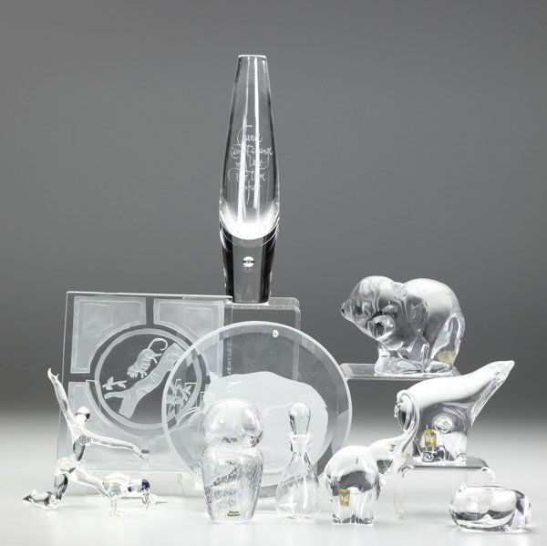 ART GLASS: ART GLASS Eleven-piece group lot of crystal figurines, plaques, and table items, some with etched decoration, including a Robert Browning vase by Steuben, an owl figurine by Kosta, elephant and polar
