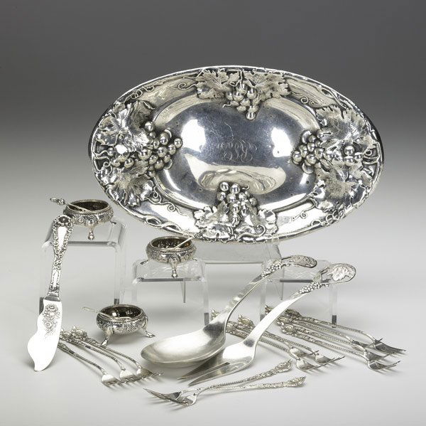 AMERICAN & ENGLISH SILVER: AMERICAN & ENGLISH SILVER Ca. 1874-1910. Frank M. Whiting hand made grapevine handled serving spoon and fork, 9''; (3) footed salt dips Martin Hall & Co., London, 1874, with two original spoons, one b