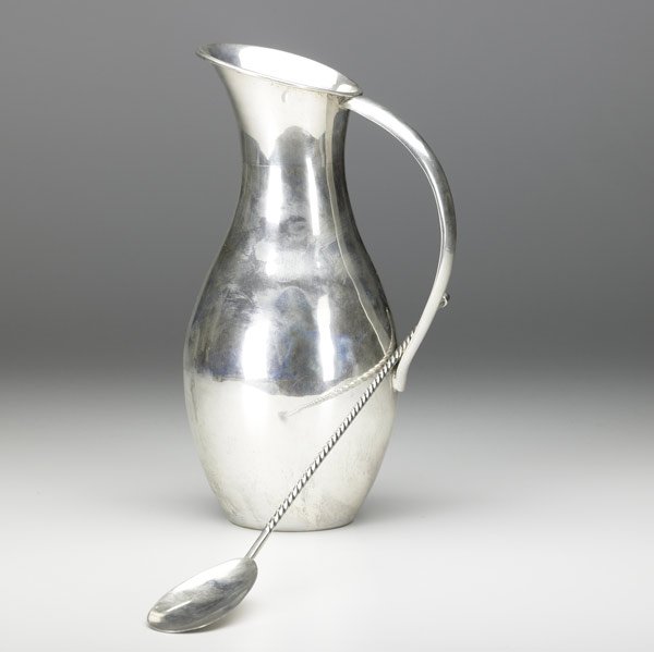 MEXICAN SILVER : MEXICAN SILVER Modernist pitcher and cocktail spoon. Juvento Lopez Reyes hollow ware water pitcher together with a Dorantese Mijos cocktail spoon with twisted handle. 21.35 OT. Pitcher: 10'' x 4'' dia