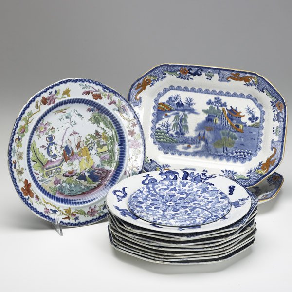 ENGLISH IRONSTONE Grouping of fourteen pieces: ENGLISH IRONSTONE Grouping of fourteen pieces include nine Herculaneum plates, three Mason's pieces, Oriental design plate and a trivet. Largest: 8'' x 11''