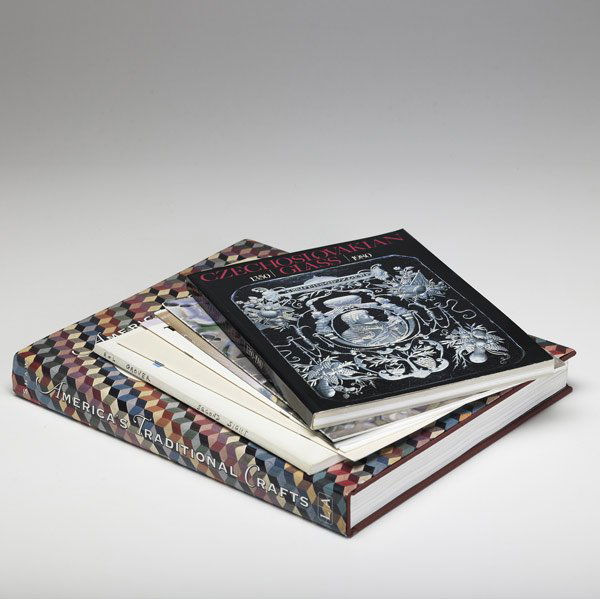 BOOKS AND EPHEMERA Box lot: BOOKS AND EPHEMERA Box lot of books including 'America's Traditional Crafts' by Robert Shaw, 1993, along with an assortment of catalogs and pamphlets on glass. Some duplicates.