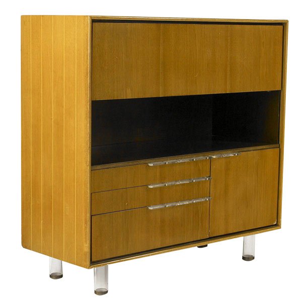 GILBERT ROHDE / HERMAN MILLER Drop-front desk: GILBERT ROHDE / HERMAN MILLER Drop-front desk with string inlay to case, fitted interior, and four drawers, with lucite legs and pulls. Stenciled no. 3970. 39'' x 40'' x 16 1/2''