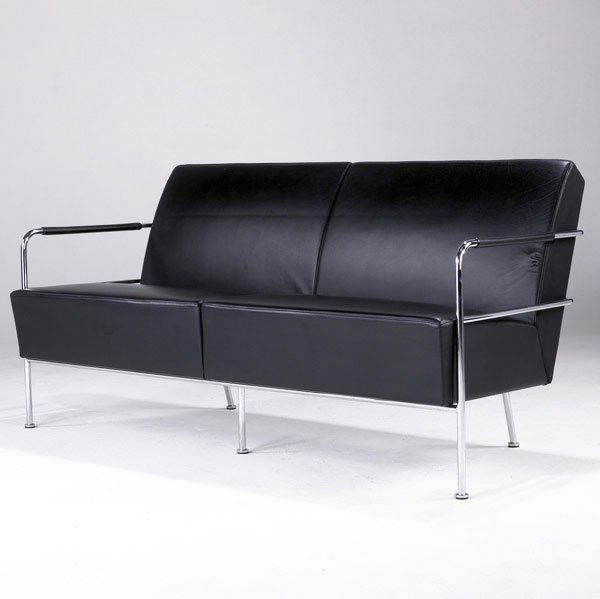GUNILLA ALLARD Sofa upholstered in black leather: GUNILLA ALLARD Sofa upholstered in black leather on chromed steel tubular base. 31 1/2'' x 62 1/2'' x 25 1/2''