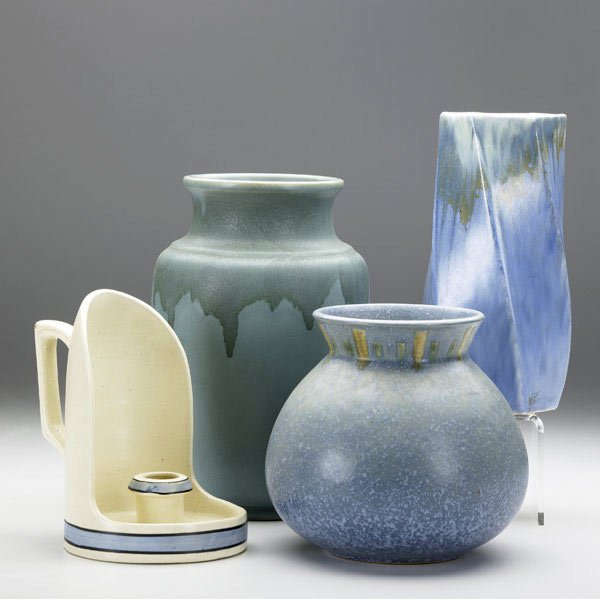 ROSEVILLE Carnelian I, Tourmaline, Windsor: ROSEVILLE Four items: green Carnelian I 9 1/2'' vase; Tourmaline 1/4'' twisted vase (on a Futura shape); blue Windsor 6 1/2'' vase, 1'' bruise to footring; and Ivory Ware candlesconce. Carnelian marke