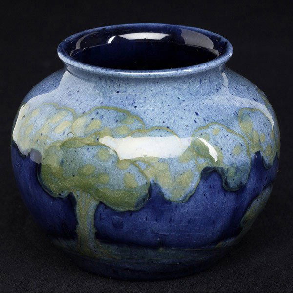 MOORCROFT Cabinet vase in Moonlit Blue: MOORCROFT Cabinet vase in the Moonlit Blue pattern, 1918-29. Stamped MOORCROFT MADE IN ENGLAND M56. 2 3/4'' x 3''
