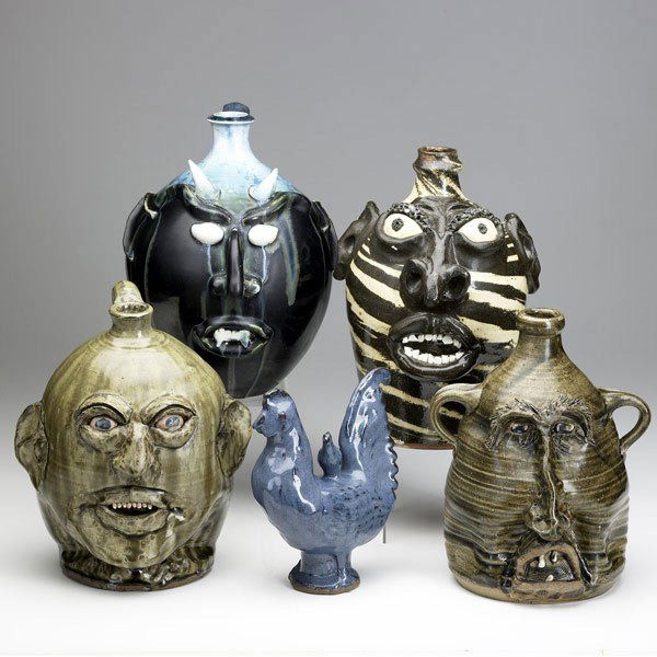 SOUTHERN FOLK ART Five items: SOUTHERN FOLK ART Five items: three face jugs by Phil Morgan, 1993, 11'', Sam Manno, 11 1/2'' and McLennan Pottery, 1987, 10 1/2''; Billy Ray Hussey, 11 1/2''; and a Charles Moore for Jugtown double r