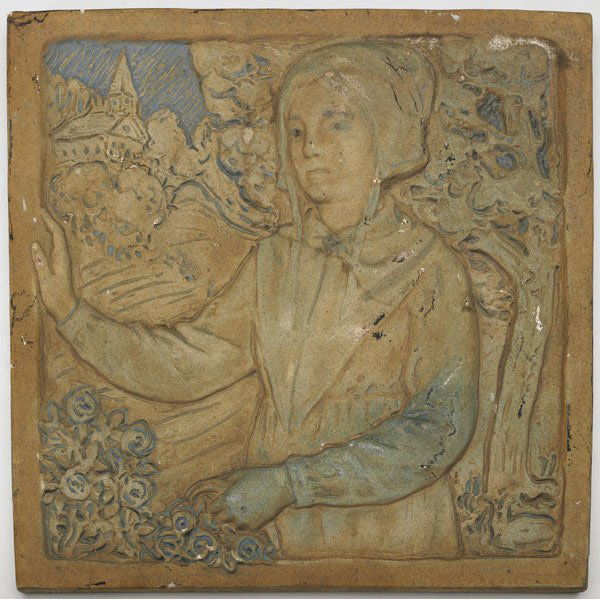 BATCHELDER Rare tile with Dutch girl: BATCHELDER Rare square tile embossed with a Dutch girl by a bed of roses in front of a village in blue engobe glaze. Mounted in a new Arts & Crafts frame. Hand signed F524L. 11 3/4'' sq.