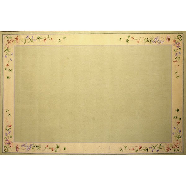 EDWARD FIELDS Wool room-size rug: EDWARD FIELDS Virgin wool room-size rug with mint green ground surrounded by floral border 1987. Stamped Edward Fields copyright 1987 on back. 166 1/'' x 113''