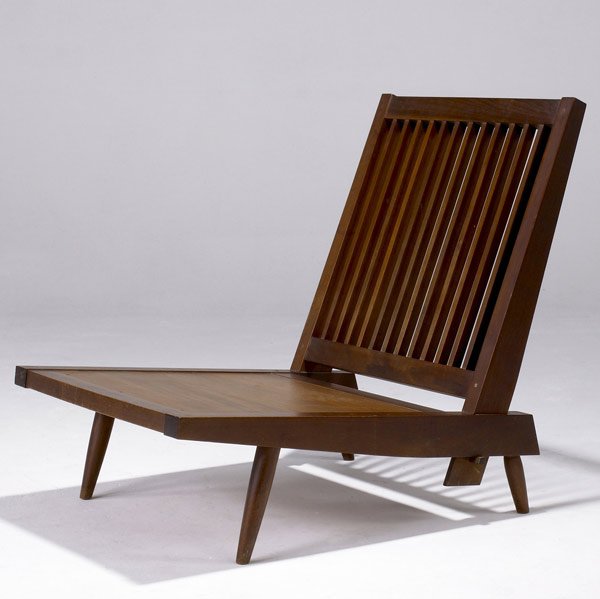 GEORGE NAKASHIMA Slat-back lounge chair: GEORGE NAKASHIMA Slat-back armless lounge chair in walnut. (Provenance available.) 30 1/2'' x 25 1/4'' x 30 3/4''