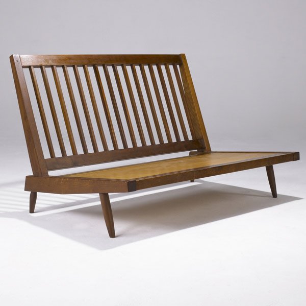GEORGE NAKASHIMA Slat-back armless settee: GEORGE NAKASHIMA Slat-back armless settee in walnut. (Provenance available.) Plywood seat marked with client's name. 30 1/2'' x 48 1/2'' x 30 1/2''