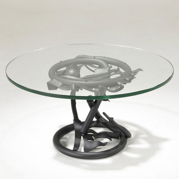 ALBERT PALEY Occasional Table: ALBERT PALEY Vortex occasional table with circular glass top over forged and fabricated steel base. Signed ALBERT PALEY 2006. 18'' x 36''; top 3/4''