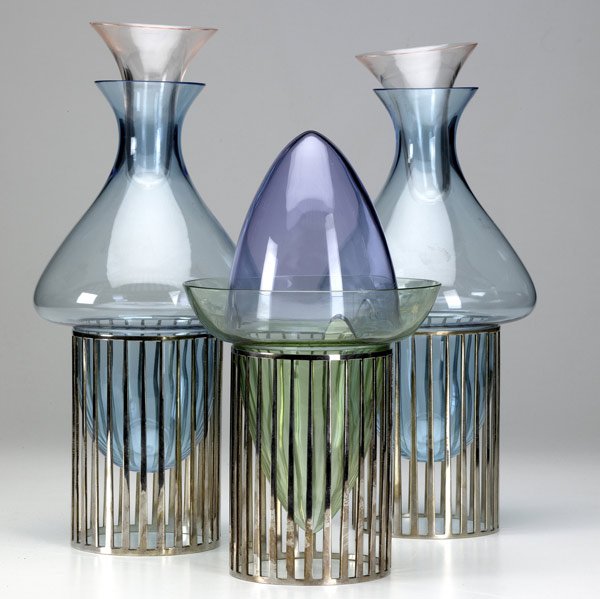 LINO SABATTINI Three Palaffita vessels: LINO SABATTINI Group of three Palaffita vessels in silver-plate and colored glass, two carafes and a juicer. Two bases stamped Sabattini Italy, one stamped Sabattini Made in Italy, with hallmark. 14''