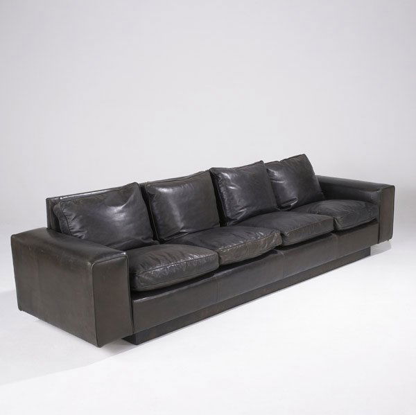 JEAN MICHEL FRANK / COMTE (attr.) Four-seat sofa: JEAN MICHEL FRANK / COMTE (attr.) Four-seat sofa completely covered in dark brown leather. 30'' x 118 1/2'' x 33 1/4''