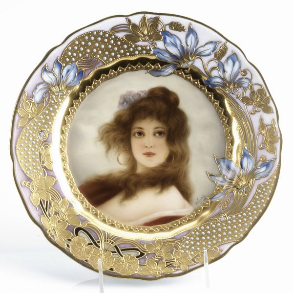 Royal Vienna hand-painted portrait plate : Royal Vienna hand-painted portrait plate with gilt floral decoration, early 20th C. Titled 'Carmen,' artist signed Wagner. Beehive mark. 9 1/2'' dia.