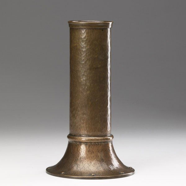 Roycroft hammered copper vase: Roycroft hammered copper vase with riveted flaring base. Early Orb and Cross mark. 10 1/2'' x 6''