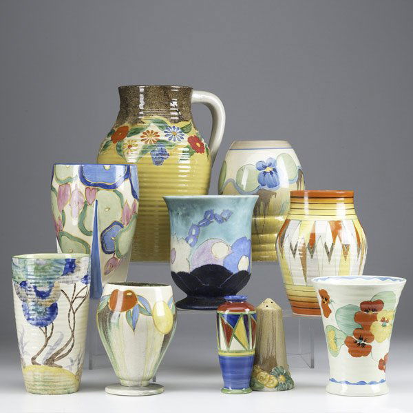 Ten pieces of Clarice Cliff: Ten pieces of Clarice Cliff: Rhodanthe Sunrise 8'' vase, 4303; Pansy Bonjour 8'' vase, 362, 2'' tight interior body line, a few paint flakes; Blue Chintz 8'' vase, 452; Inspiration 7'' vase, 353, burs