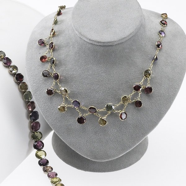 GEM-SET FRINGE NECKLACE & BRACELET : GEM-SET FRINGE NECKLACE & BRACELET Both in 14k yg, 20th C. Multi-hue gemstones include tourmalines, zircons, garnets, peridots, spinels and sapphires. 15 1/2'' necklace, 6 1/2'' link bracelet.