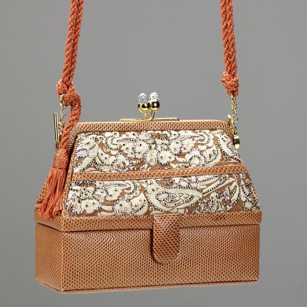 JUDITH LEIBER KARUNG SKIN EVENING BAG: JUDITH LEIBER EMBROIDERED AND KARUNG SKIN EVENING BAG Salmon colored, bi-compartment. Acorn-form clasp, coral tone cord strap. 5 1/8'' x 6''