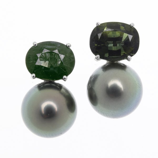 GREEN SAPPHIRE & TAHITIAN PEARL EARRINGS : GREEN SAPPHIRE & TAHITIAN PEARL EARRINGS Each earring with an opal faceted green sapphire in lateral basket setting above a bluish-green black pearl, in 18k wg setting. Sapphires: 5.50 cts. TW. Pearls