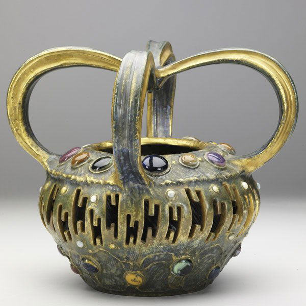 RIESSNER & KESSEL Gres-Bijou ceramic basket: RIESSNER & KESSEL Pierced Amphora Gres-Bijou four-handled ceramic basket, 1899-1900 Restoration to a few areas of reticulation Stamped AMPHORA AUSTRIA CROWN 3792 10'' x 10 3/4''