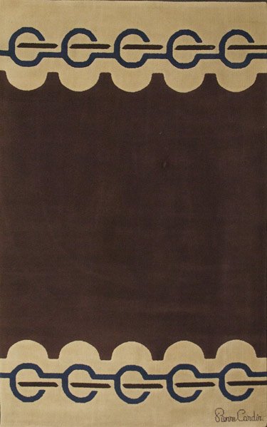 PIERRE CARDIN Large wool rug: PIERRE CARDIN Large wool rug with purple and brown pattern on taupe ground Signed lower corner and fabric label to verso 130'' x 81''