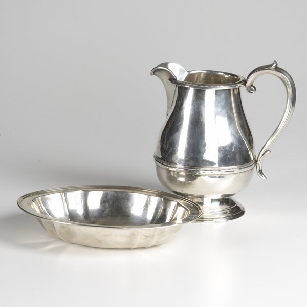 AMERICAN SILVER: AMERICAN SILVER Reed & Barton baluster form five pint water pitcher together wtih a Watson & Co. oval serving bowl. 30.23 OT. Pitcher: 9 1/2''