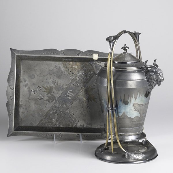 MERIDEN & CO. SILVER PLATED ICE WATER PITCHER: MERIDEN & CO. Victorian silver plated ice water pitcher on stand with polar bear design on body and ram's head relief decoration together with a plated tray. Pitcher: 17''