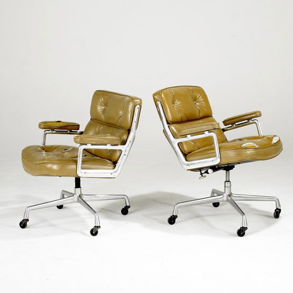 EAMES FOR HERMAN MILLER TIME LIFE ARMCHAIRS: CHARLES & RAY EAMES FOR HERMAN MILLER Pair of rolling Time-Life armchairs. Each with Herman Miller label. 33'' x 29'' x 27''