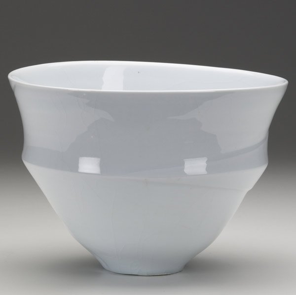 ANNE MARIE BACKER-MOHR THROWN PORCELAIN BOWL: ANNE MARIE BACKER-MOHR Thrown porcelain bowl with sculptural details covered in pale celadon glaze. Signed with artist's cipher. 6 1/2'' x 9'' dia.