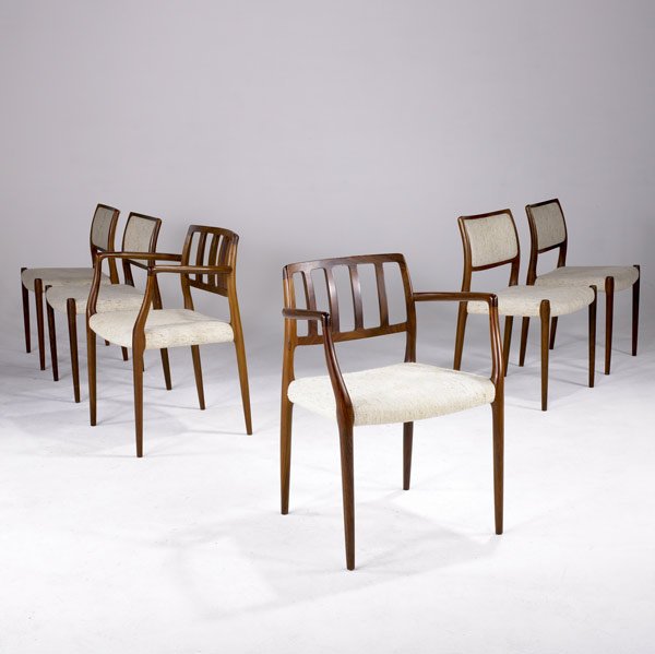 J.L. MOLLER SIX ROSEWOOD DINING CHAIRS: J.L. MOLLER (Denmark) Set of six rosewood dining chairs upholstered in oatmeal wool, two arm- four side-. Branded J.L. Moller Denmark. Arm: 31'' x 22 1/2'' x 19''; side: 30 1/2'' x 19 1/2'' x 17 1/2''