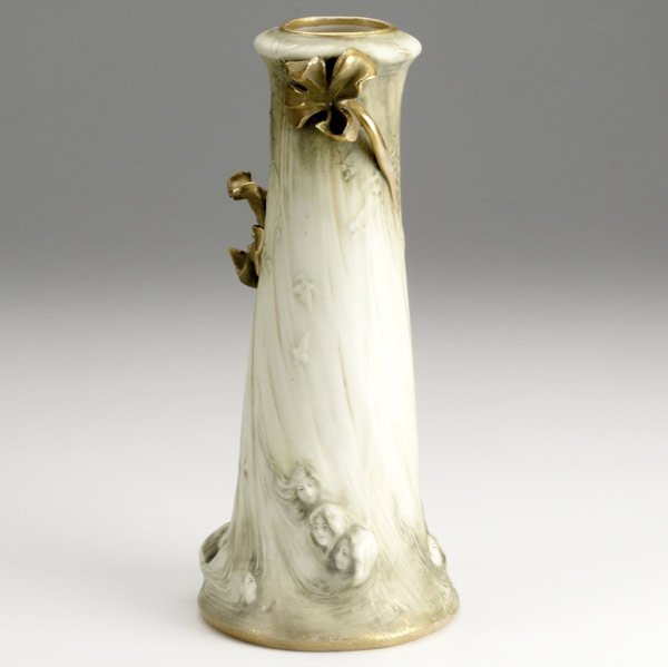 RIESSNER, STELLMACHER & KESSEL (AMPHORA): RIESSNER, STELLMACHER & KESSEL (AMPHORA) Art Nouveau porcelain vase by Edward Stellmacher with ladies heads, butterflies and waves. Some losses, as-is. Red RSTK stamp, raised Amphora mark. 10 1/4'' x