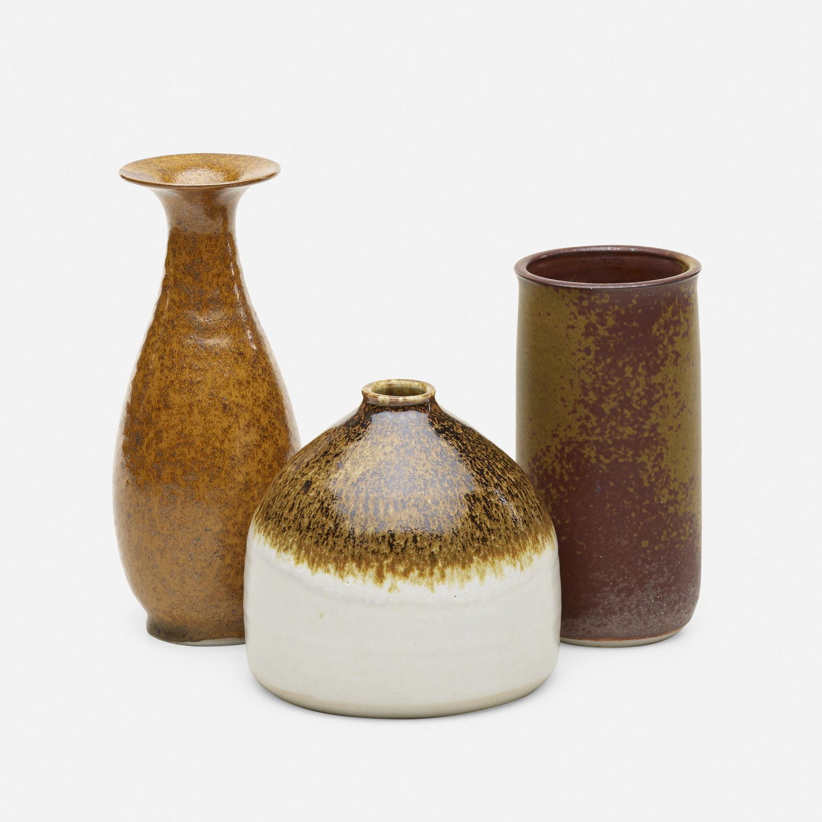 Brother Thomas Bezanson, Collection of three vases: Brother Thomas Bezanson Collection of three vases Canada/USA, c. 1970iron and textured iron-glazed porcelain tallest: 7.75 h × 3.25 dia in (20 × 8 cm) shortest: 5 h × 5 dia in (1