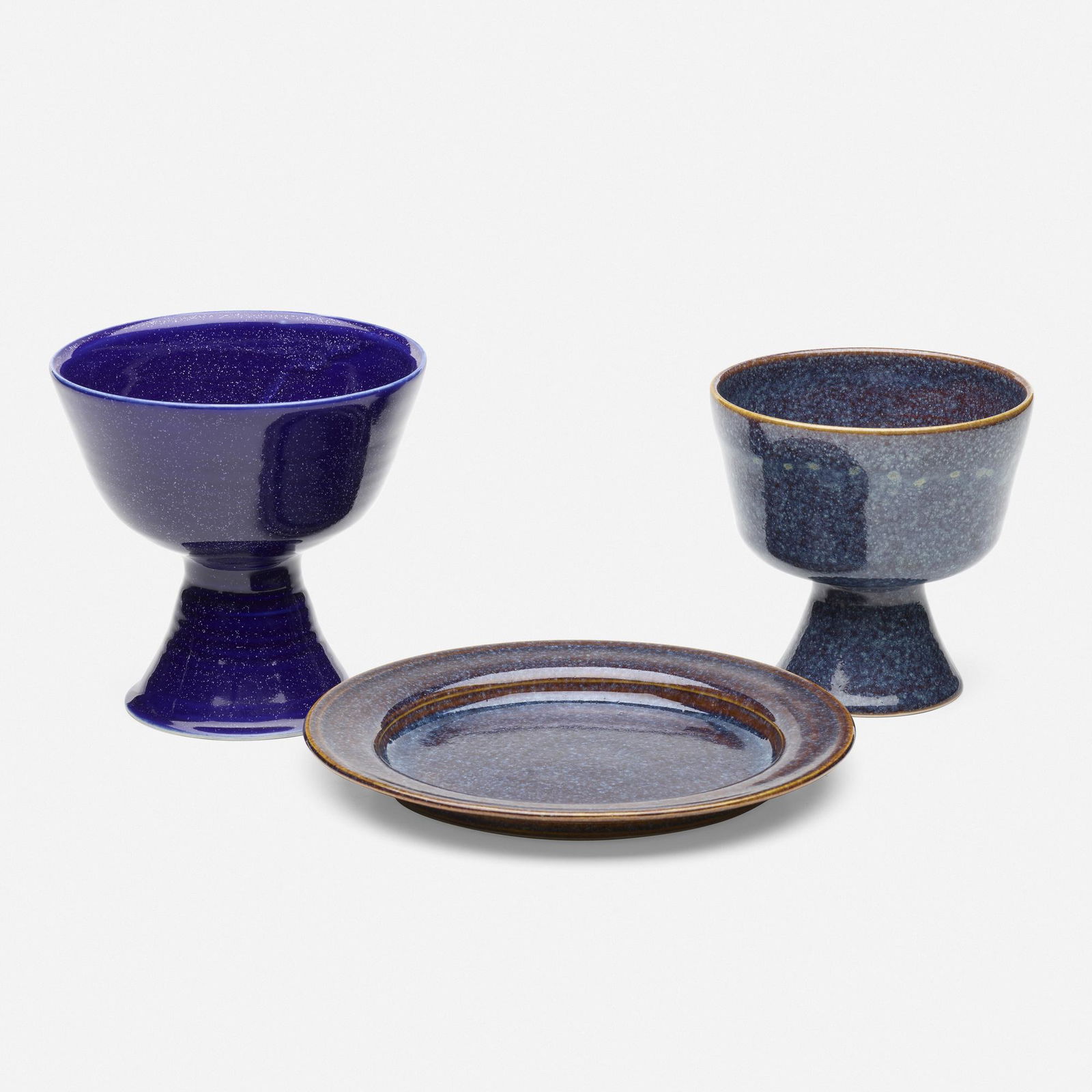 Brother Thomas Bezanson, Plate and two chalices: Brother Thomas Bezanson Plate and two chalices Canada/USAglazed porcelain taller chalice: 5.75 h × 6 dia in (15 × 15 cm) shorter chalice: 5 h × 5.25 dia in (13 × 13 cm)