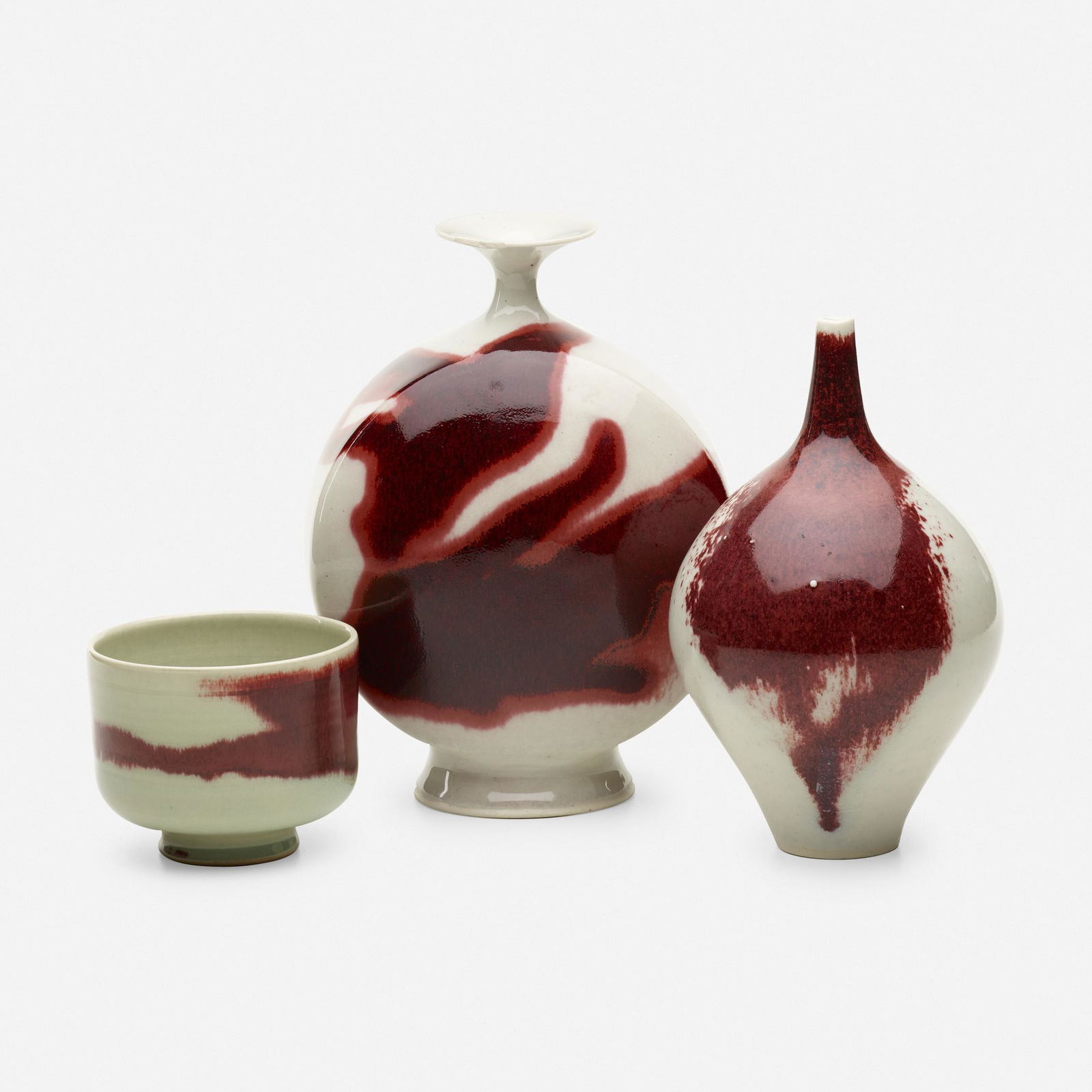 Brother Thomas Bezanson, Collection of three vessels: Brother Thomas Bezanson Collection of three vessels Canada/USA, c. 1970-80copper red on opal white-glazed porcelain tallest: 9.5 h × 7 w × 4.25 d in (24 × 18 × 11 cm) bowl: