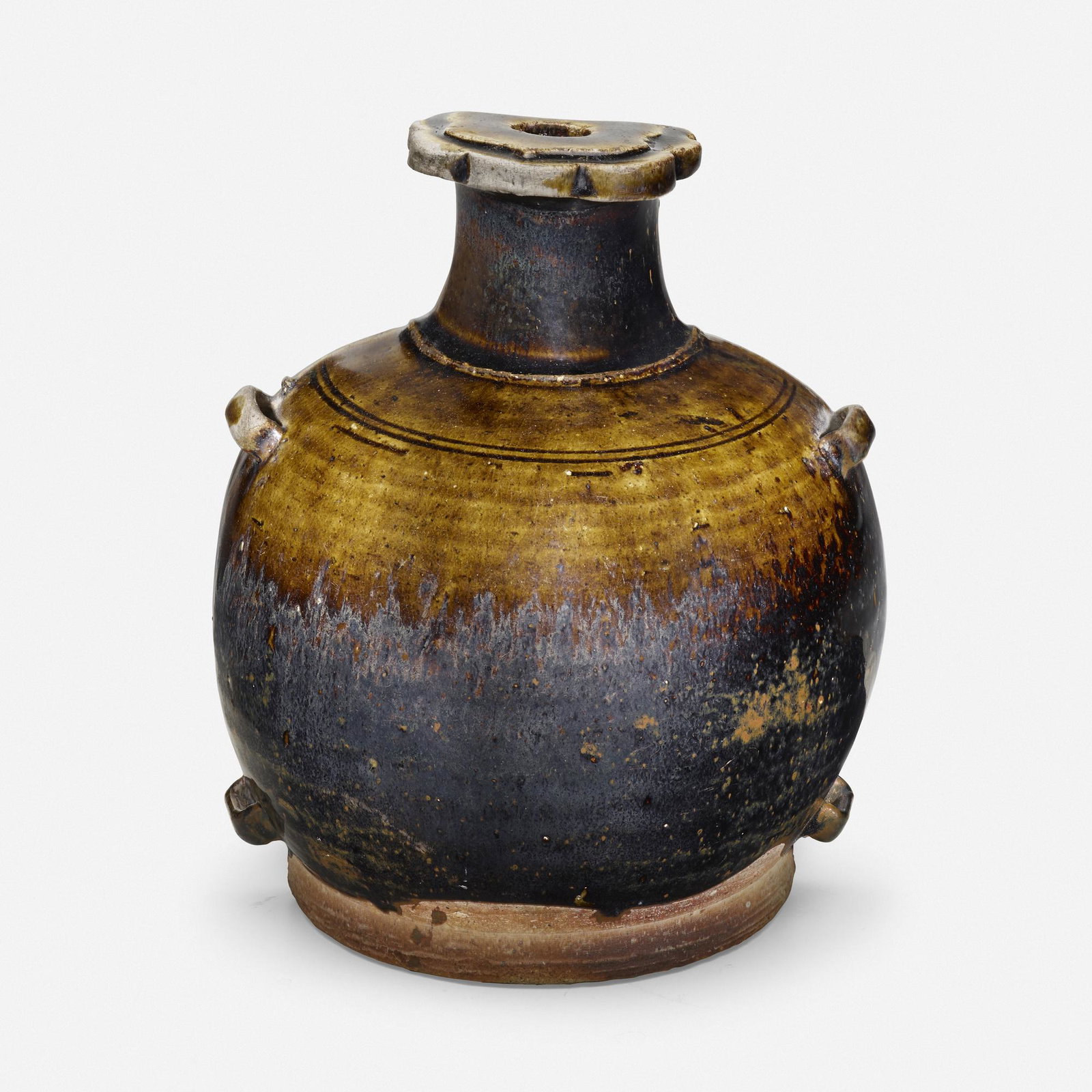 Chinese, Unusual Black and Brown-glazed wall vase: Chinese Unusual Black and Brown-glazed wall vase Song to Jin Dynasty, 12th-13th century 9.25 h × 7 w × 3.5 d in (23 × 18 × 9 cm)
