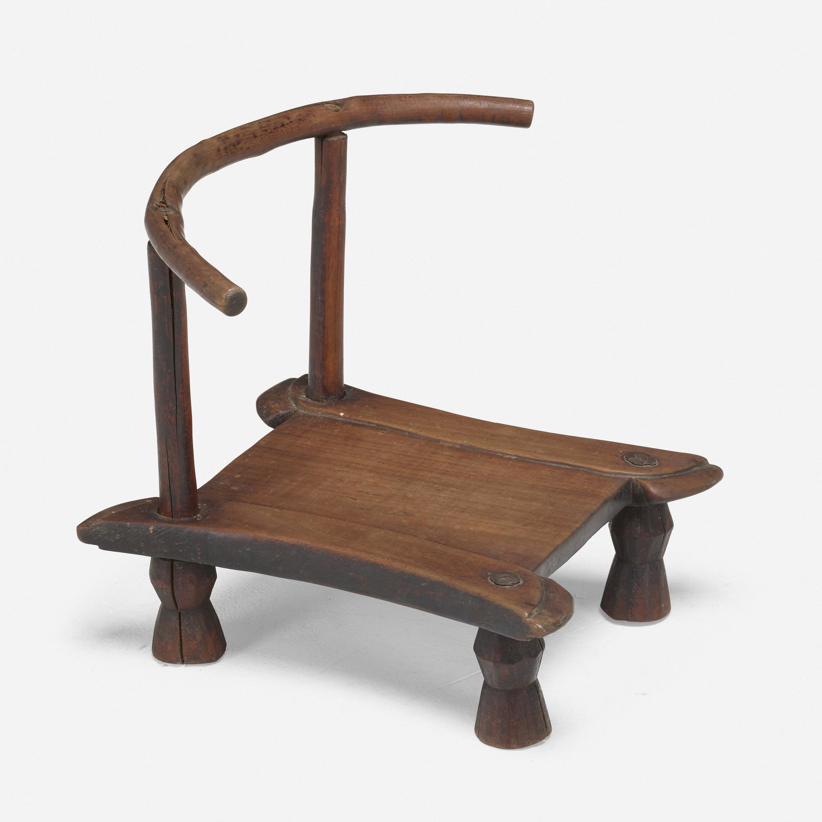 Dan artist, Chair: Dan artist Chair Liberia/Cote d'Ivoire, 19th centurycarved hardwood 13 h × 17.5 w × 13.75 d in (33 × 44 × 35 cm) Provenance: Collection of Robert Wilso