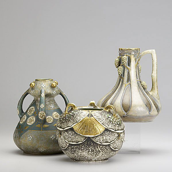 PAUL DACHSEL; KUNSTKERAMIK; TURN TEPLITZ: PAUL DACHSEL; KUNSTKERAMIK; TURN TEPLITZ; Three pieces of Amphora, early 20th c.: four-handled vase with floral decoration, Paul Dachsel Co. factory stamp; ewer with relief grape clusters, Paul Dachse