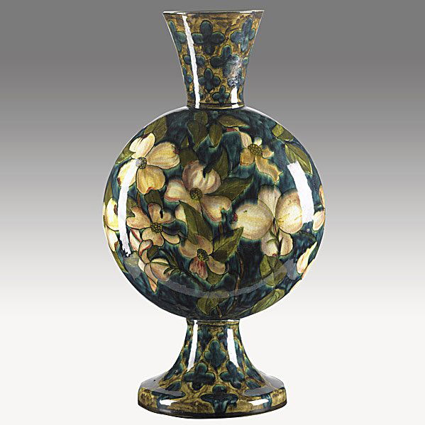 JOHN BENNETT Footed pillow vase: JOHN BENNETT; Footed pillow vase with dogwood blossoms; Minute fleck to rim; J BENNETT E24 N.Y. MJ; 14'' x 8'' Class: CR Manufacturer: Artist:Bennett, John