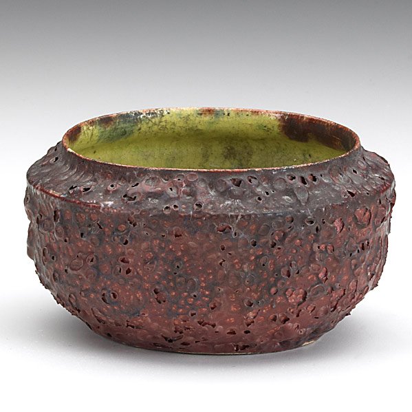 GEORGE OHR Squat vessel : GEORGE OHR; Squat vessel in raspberry volcanic glaze; A couple minor flakes; Stamped G.E. OHR, Biloxi, Miss.; 2 1/4'' x 4'' Class: CR Manufacturer: Artist:Ohr, George