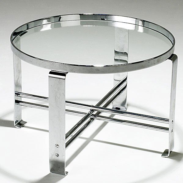 WOLFGANG HOFFMANN; HOWELL Cocktail table: WOLFGANG HOFFMANN; HOWELL; Rare chrome-plated steel cocktail table with inset plate glass top, c. 1930; Unmarked; 17'' x 25 3/4'' dia. Class: FR TA Manufacturer: HOWELL Artist:Hoffmann, Wolfgang