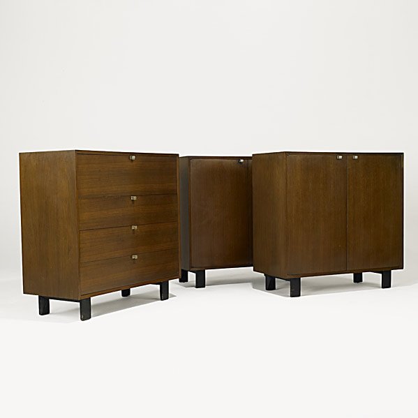 GEORGE NELSON; HERMAN MILLER 3 Pieces: GEORGE NELSON; HERMAN MILLER; Pair of two-door cabinets and a drop-down secretary desk; Foil label to desk; 39 3/4'' x 40'' x 18 1/2'' Class: FR ST DK Manufacturer: HERMAN MILLER Artist:Nelson, George