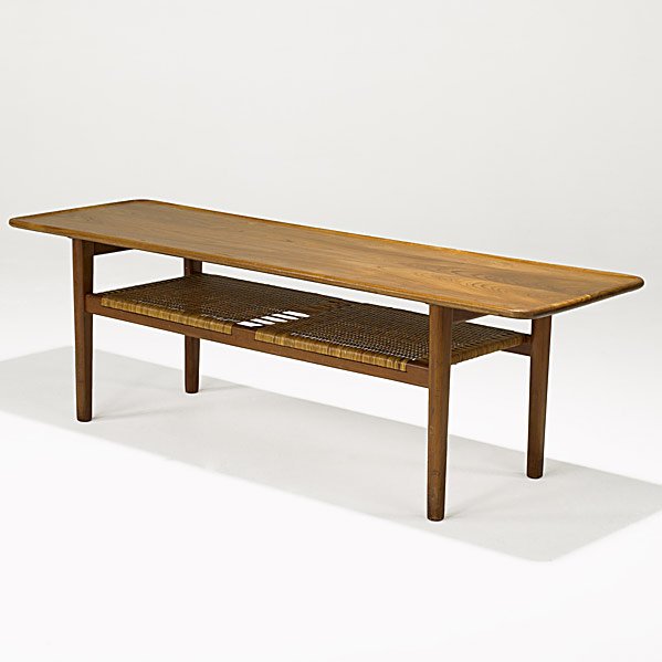 HANS WEGNER; ANDREAS TUCK Teak cocktail table: HANS WEGNER; ANDREAS TUCK (Denmark); Solid teak and split cane cocktail table, c. 1960; Branded mark; 20'' x 63'' x 19 3/4'' Class: FR TA Manufacturer: ANDREAS TUCK Artist:Wegner, Hans