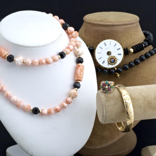 FIVE PIECES OF ANTIQUE AND ASIAN JEWELRY: FIVE PIECES OF ANTIQUE AND ASIAN JEWELRY; Carved coral and gold bead necklace, onyx and gold bead necklace, gem-set gold stacking ring, GF hinged bangle, ''watch face'' pin