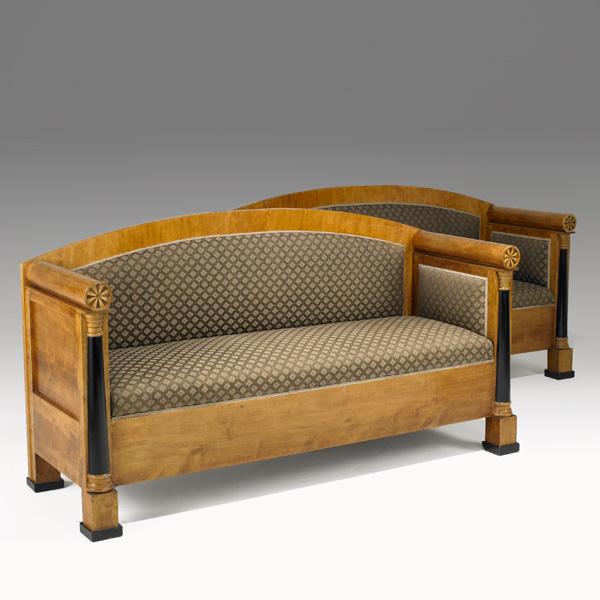 PAIR OF BIEDERMEIER SETTEES: PAIR OF BIEDERMEIER SETTEES; Pinwheel and ebonized half-column decoration, 19th c.; 38'' x 71'' x 25 1/2''